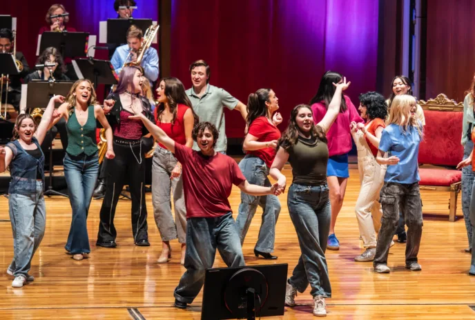 Performers dancing on stage 